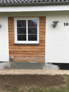 Udvendig renovering efter – ny facadebeklædning omkring vindue